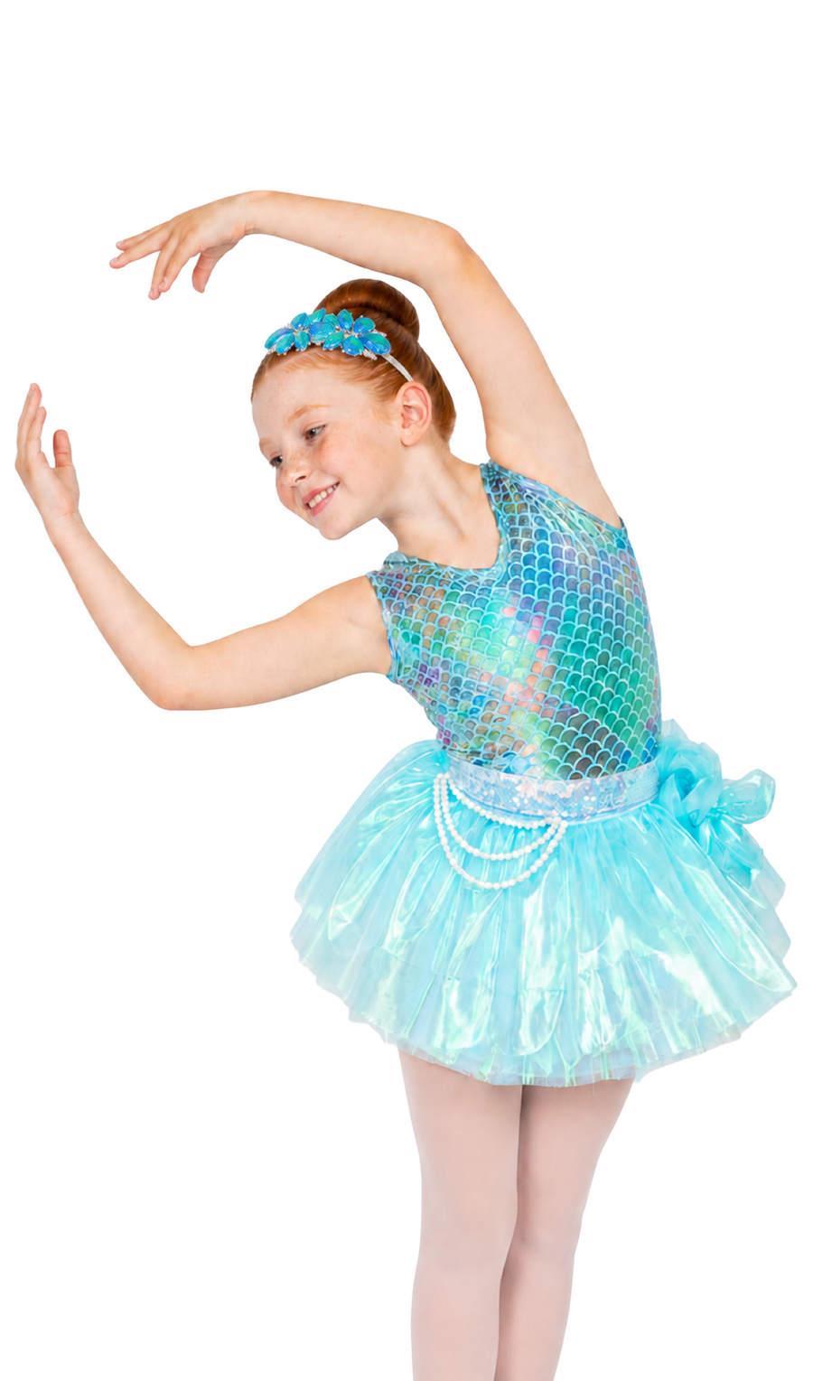 A young girl dancer posing in a mermaid-themed costume against a solid white background. 